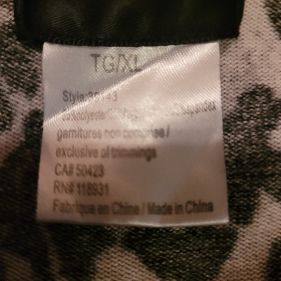 Animal print top with faux belt. - Picture 2 of 6